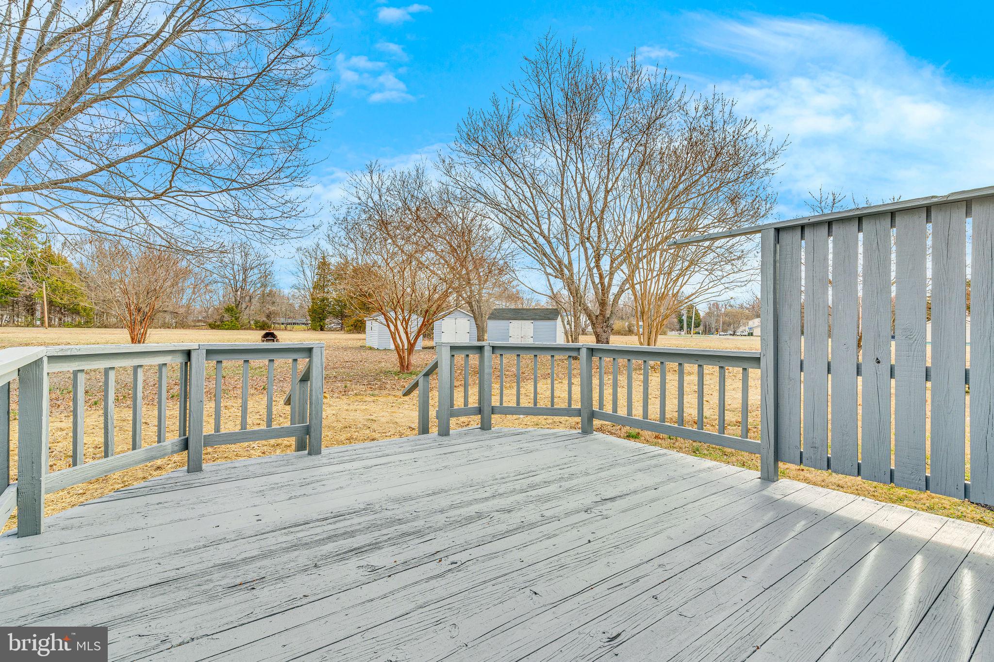 24338 Longview Road Chaptico, MD 20621 - Photo 6 of 19 a view of a wooden deck