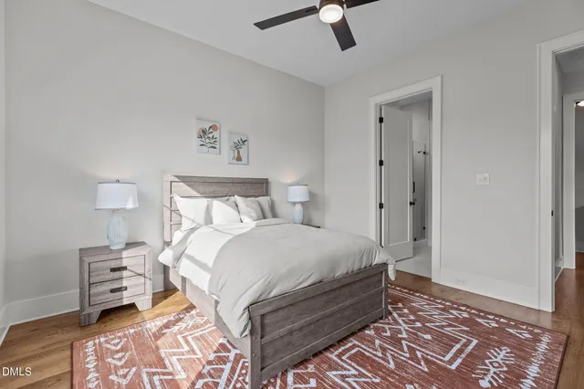 a view of a room with wooden floor