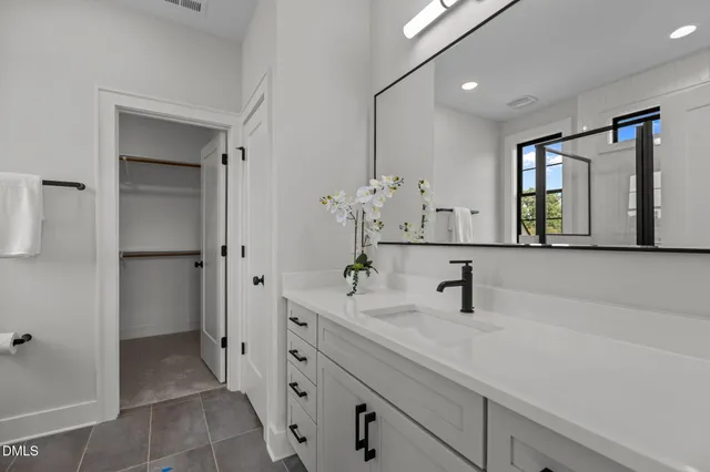 a view of a chairs and table in patio