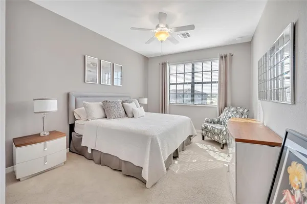 a view of a balcony with furniture