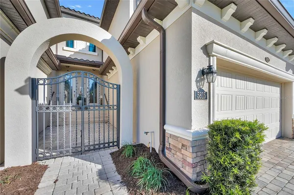 a view of a entrance gate of a house