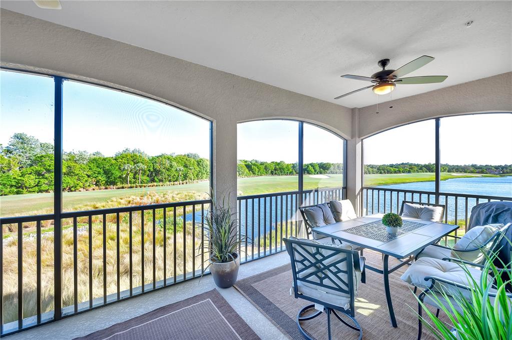 5815 Wake Forest Run, Unit 103 Lakewood Ranch, FL 34211 - Photo 27 of 63 a view of a balcony with furniture