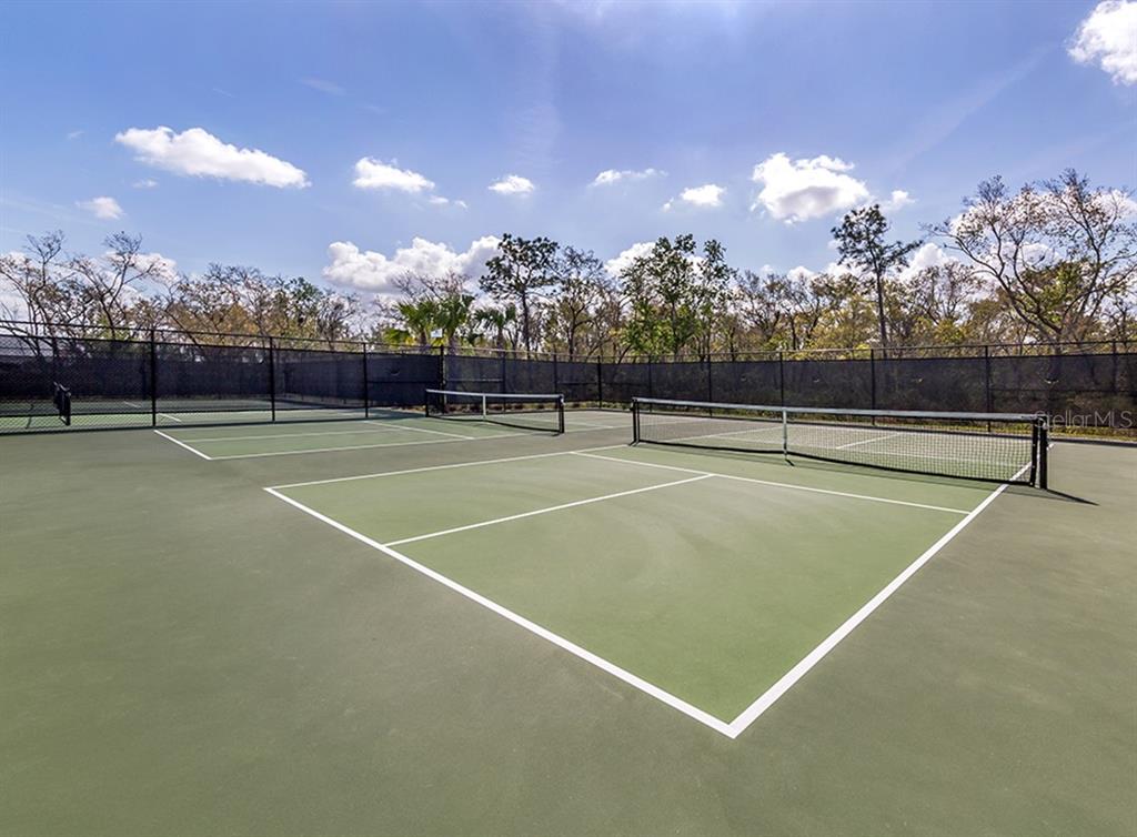 5815 Wake Forest Run, Unit 103 Lakewood Ranch, FL 34211 - Photo 37 of 63 a view of a tennis court