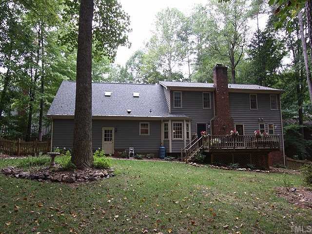7908 Jenkins Ridge Court Raleigh, NC 27613 - Photo 12 of 12 a front view of a house with garden