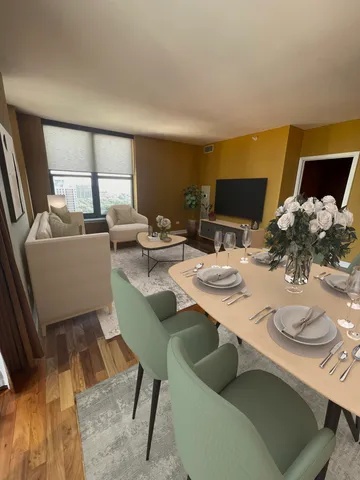 a dining room with furniture and wooden floor