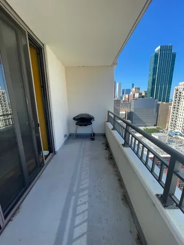 a view of hotel room with furniture