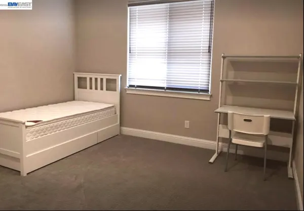 a bathroom with a shower and a tub