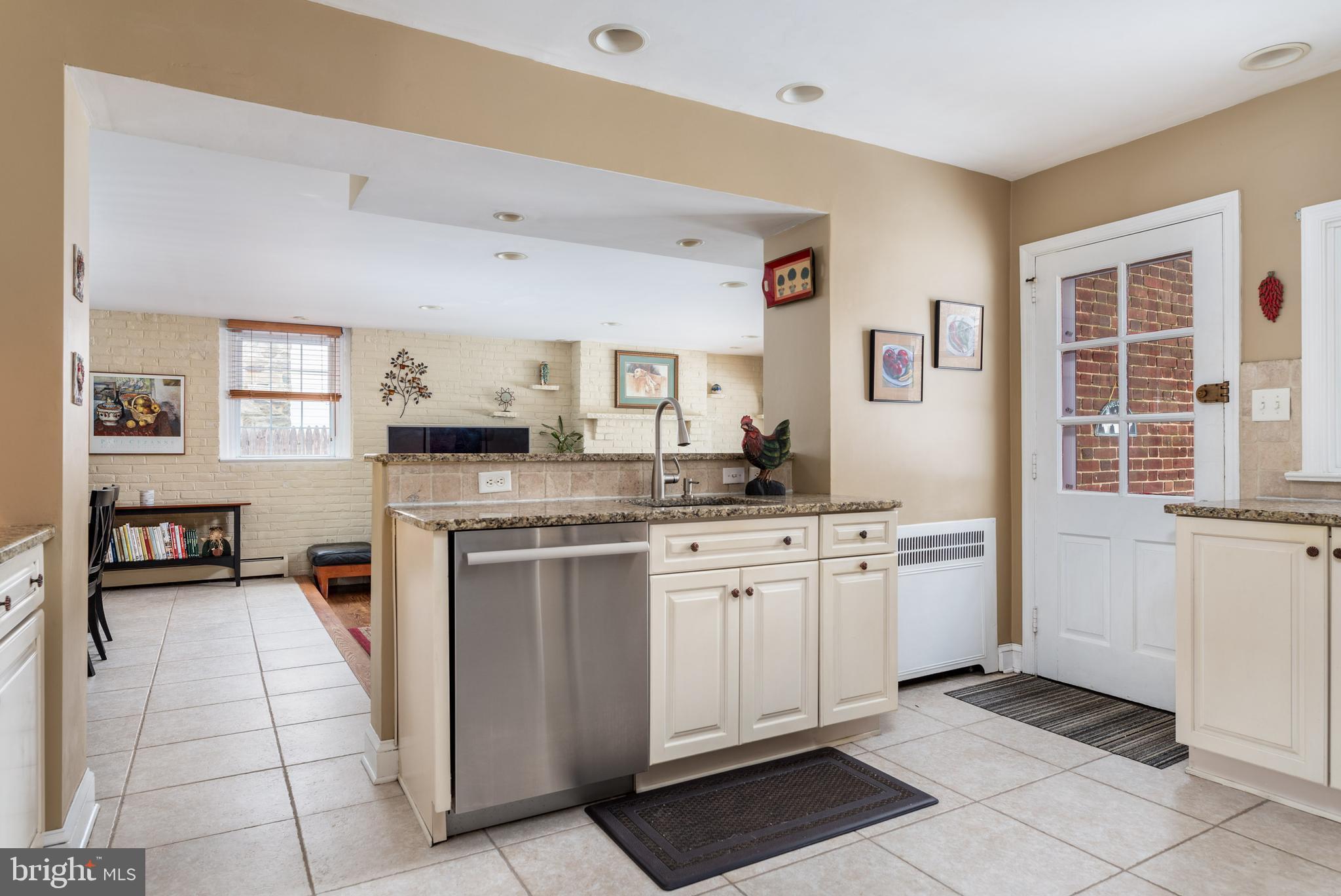 1409 Medford Road Wynnewood, PA 19096 - Photo 8 of 41 Kitchen /eating area opens to family room