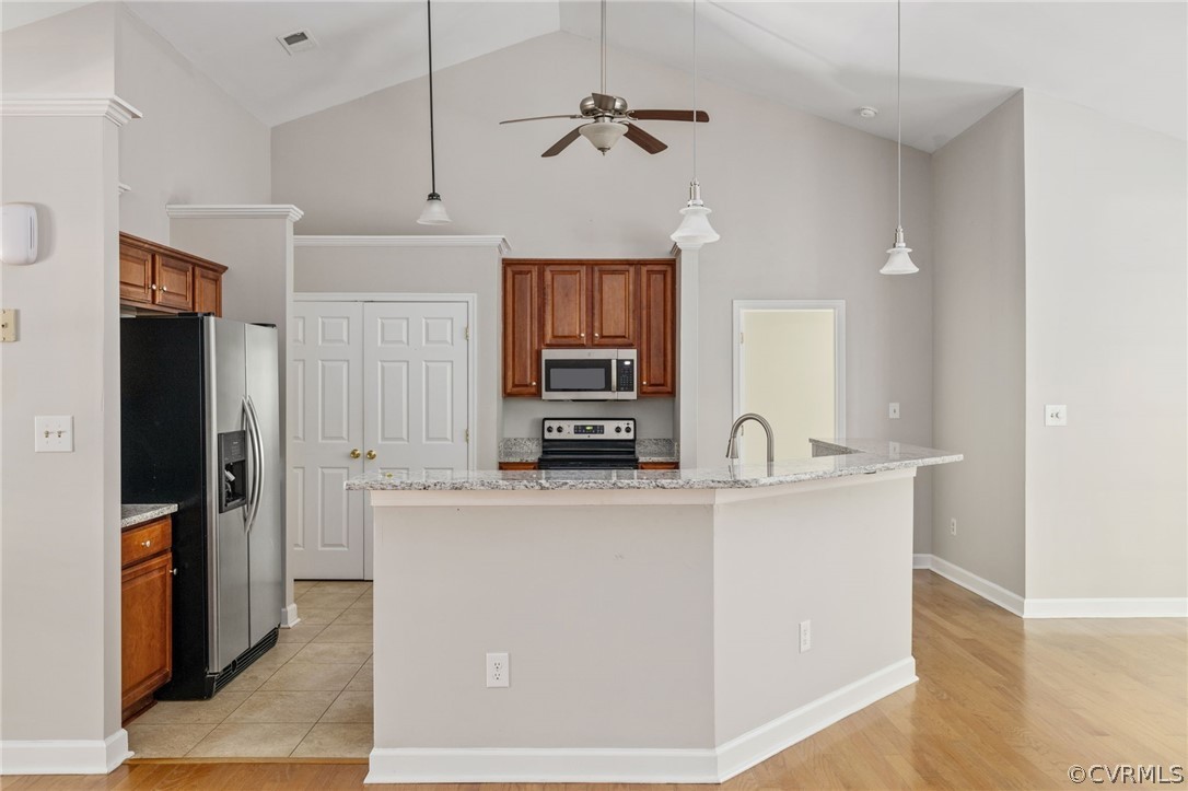 1305 Eastham Road Bumpass, VA 23024 - Photo 18 of 49 Kitchen featuring ceiling fan, an island with sink