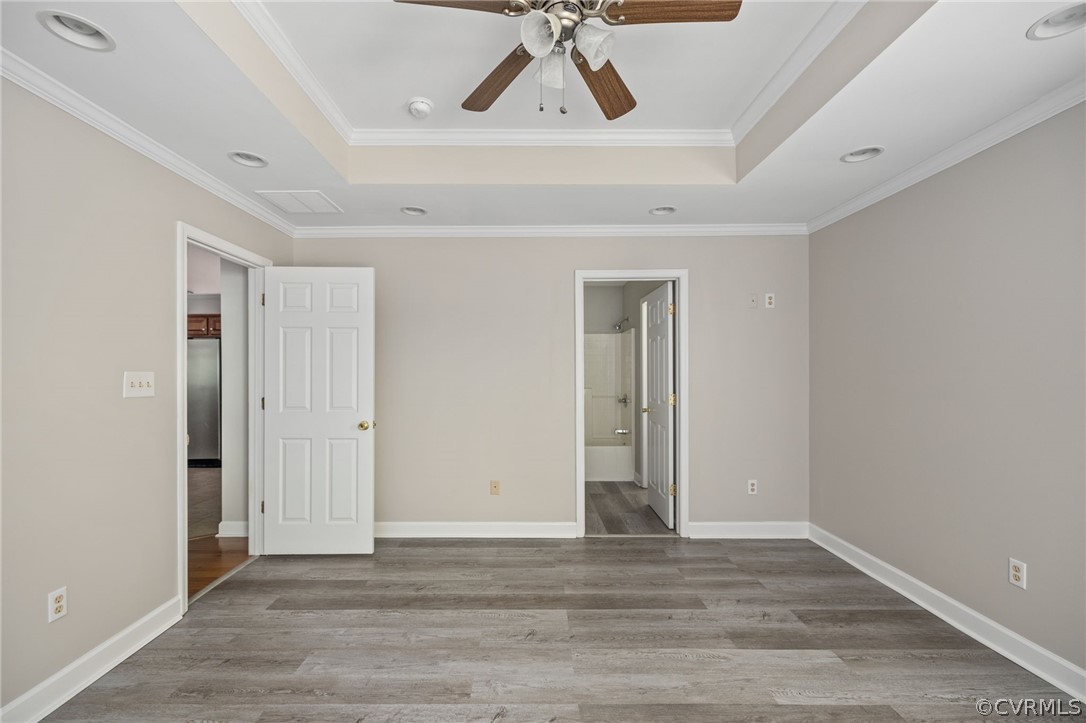 1305 Eastham Road Bumpass, VA 23024 - Photo 27 of 49 Spare room with ceiling fan, hardwood / wood-style