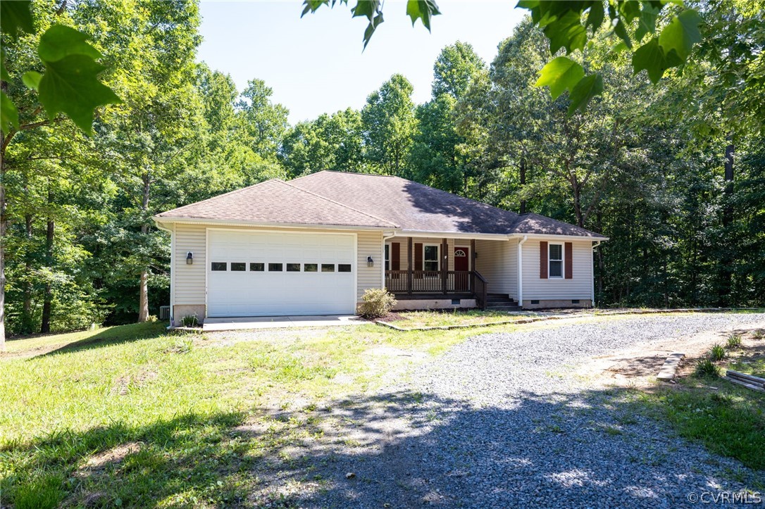 1305 Eastham Road Bumpass, VA 23024 - Photo 3 of 49 Ranch-style home featuring a garage, a front yard,