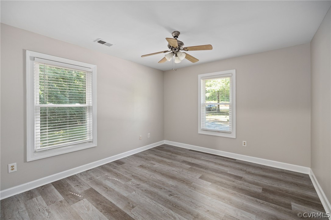 1305 Eastham Road Bumpass, VA 23024 - Photo 32 of 49 Bedroom #2 featuring hardwood / wood style floorin