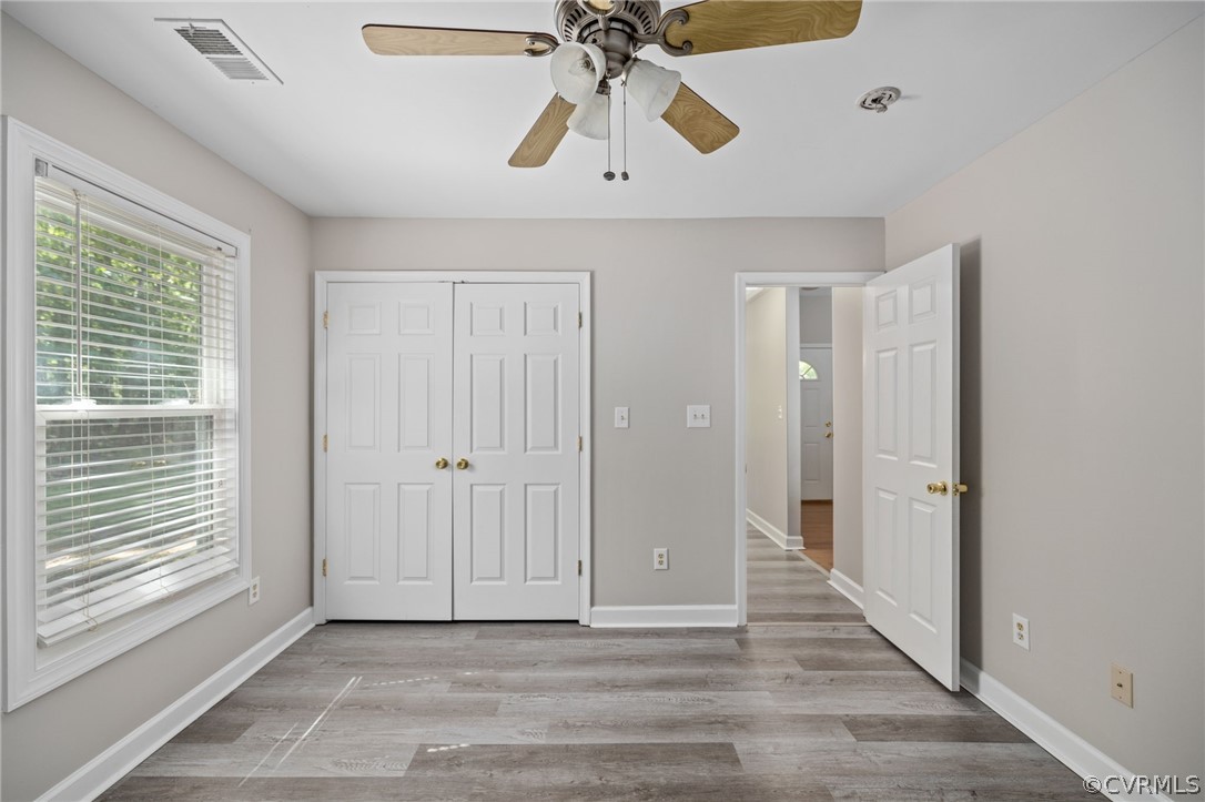 1305 Eastham Road Bumpass, VA 23024 - Photo 35 of 49 Bedroom #3 with a closet, ceiling fan, and light h