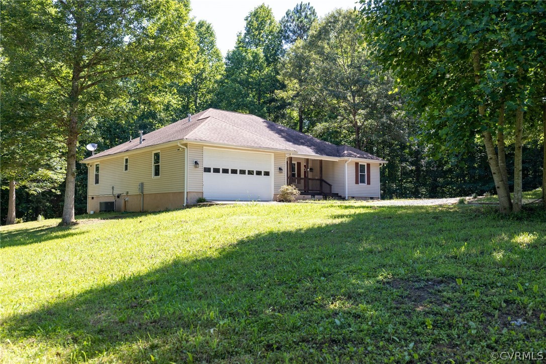1305 Eastham Road Bumpass, VA 23024 - Photo 5 of 49 Ranch-style home featuring a garage and a front la