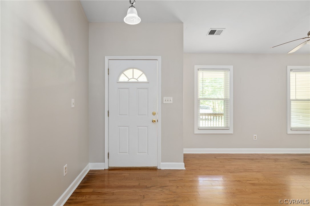 1305 Eastham Road Bumpass, VA 23024 - Photo 9 of 49 Entryway featuring ceiling fan and hardwood / wood