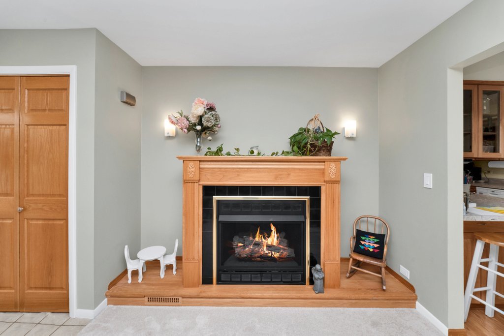 16 Tweed Road Fox Lake, IL 60020 - Photo 7 of 27 a living room with furniture and a fireplace