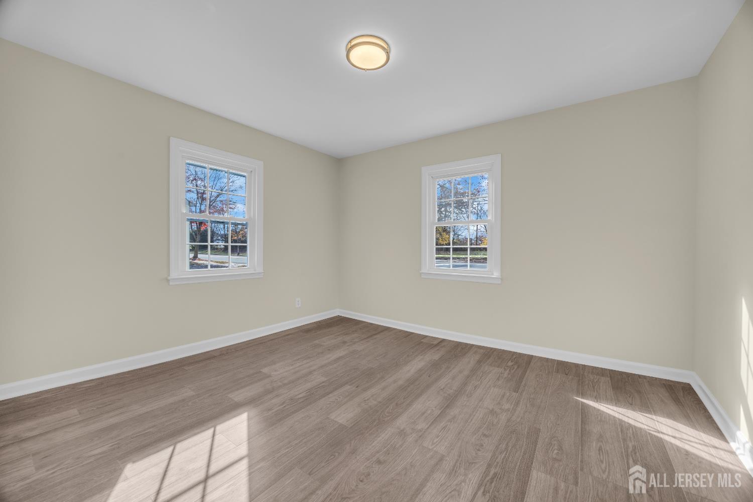 11 North Randolphville Road Piscataway, NJ 08854 - Photo 8 of 28 an empty room with a workbench