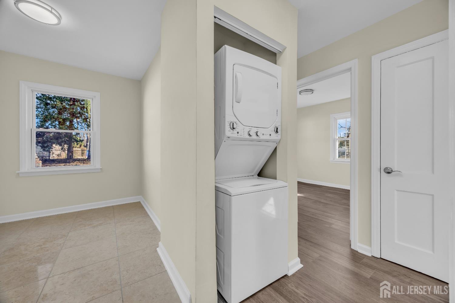 11 North Randolphville Road Piscataway, NJ 08854 - Photo 9 of 28 a room that has a window and a wooden floor