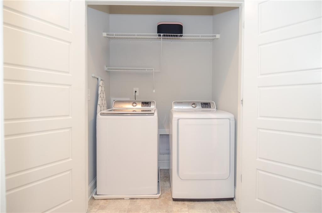 2143 Shale Lane Northwest Atlanta, GA 30318 - Photo 29 of 48 a utility room with dryer and washer
