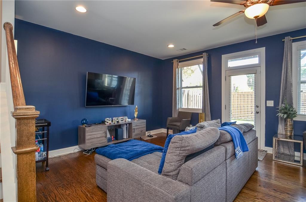 2143 Shale Lane Northwest Atlanta, GA 30318 - Photo 31 of 48 a living room with furniture and a flat screen tv