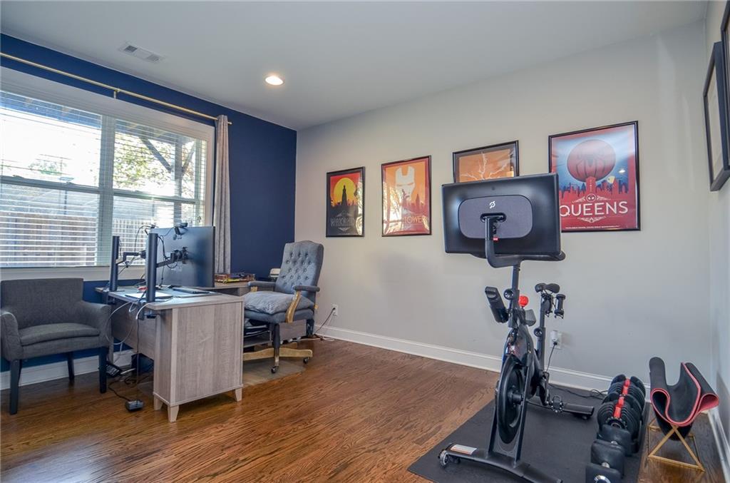 2143 Shale Lane Northwest Atlanta, GA 30318 - Photo 34 of 48 a view of a workspace with furniture and a window