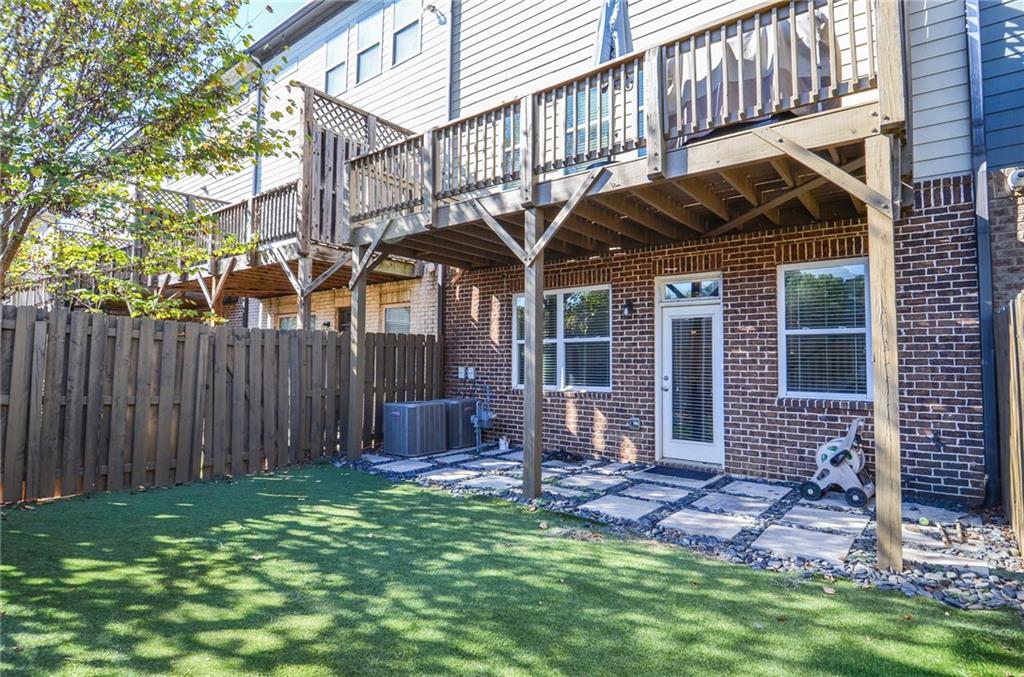 2143 Shale Lane Northwest Atlanta, GA 30318 - Photo 37 of 48 a view of a house with backyard and sitting area