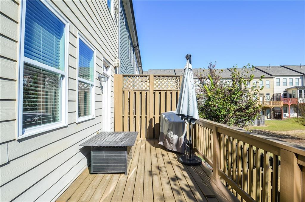 2143 Shale Lane Northwest Atlanta, GA 30318 - Photo 39 of 48 a view of a balcony with wooden floor
