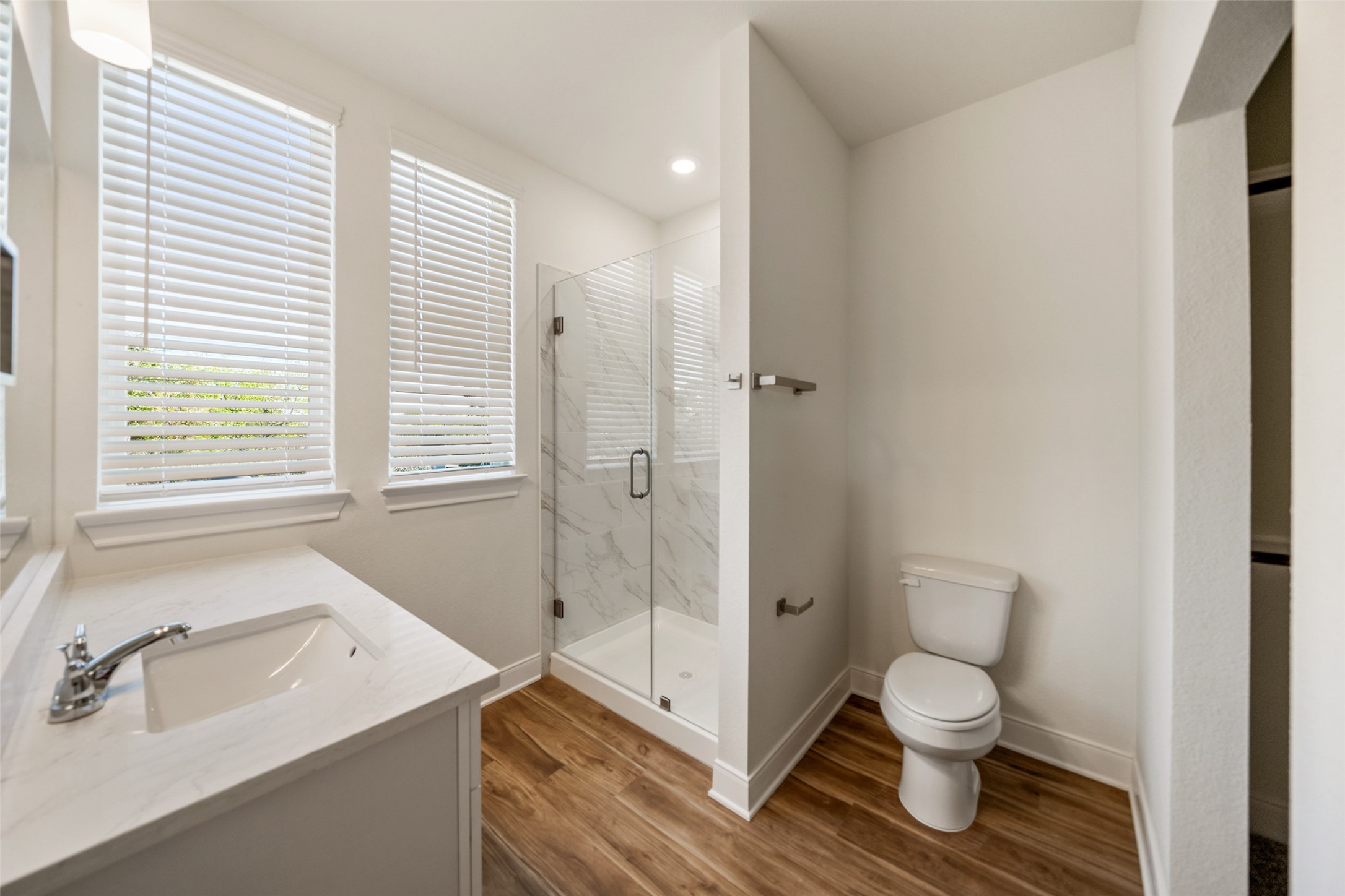 412 West Marlin Street Willis, TX 77378 - Photo 14 of 22 a bathroom with a sink and a toilet
