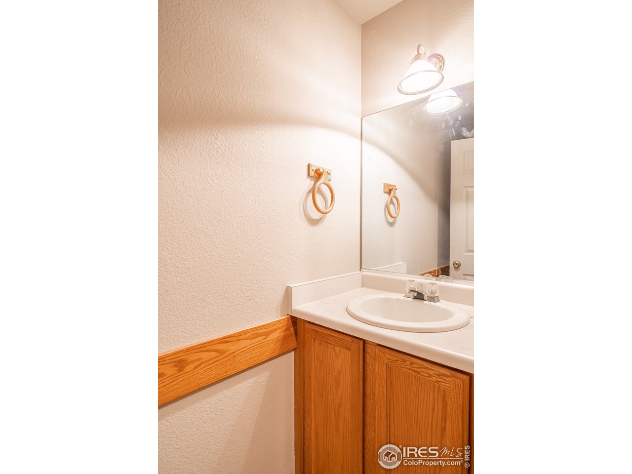 1329 Darrell Road Evans, CO 80620 - Photo 15 of 21 half bath main floor