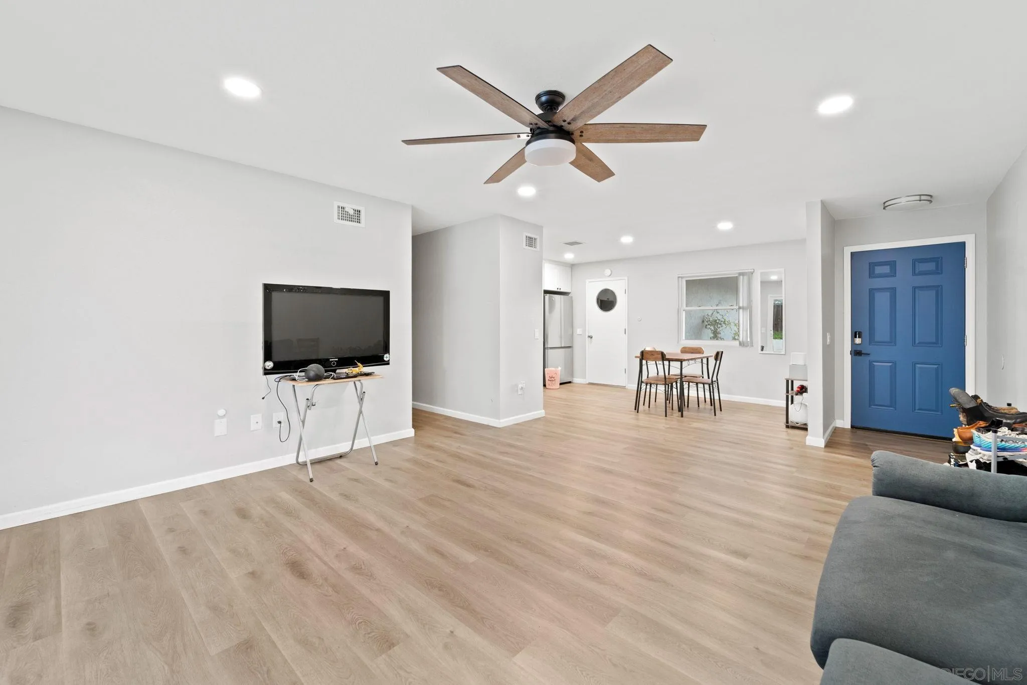 337 Osage Street Spring Valley, CA 91977 - Photo 12 of 19 a living room with furniture and a flat screen tv