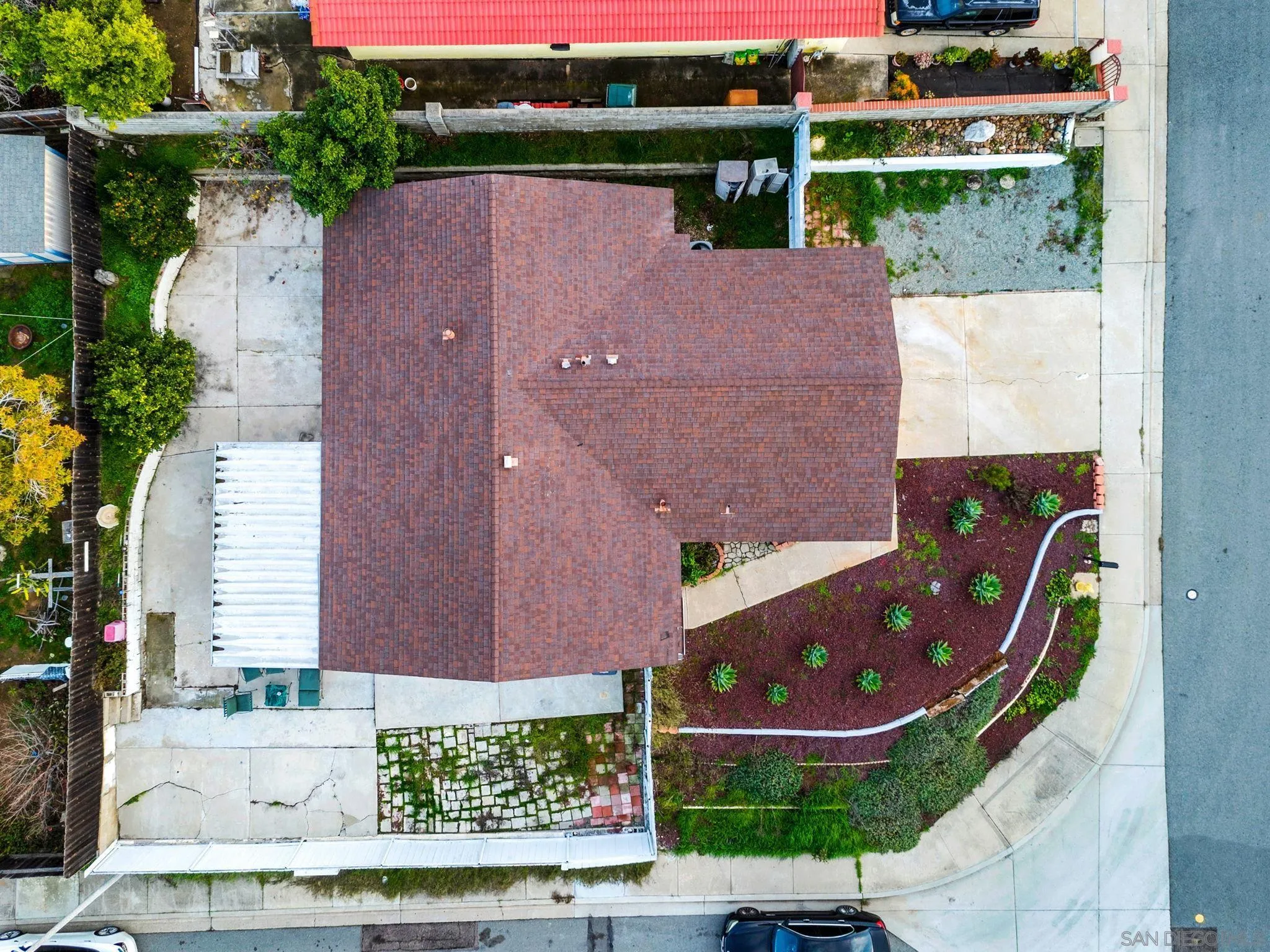 337 Osage Street Spring Valley, CA 91977 - Photo 7 of 19 an aerial view of a house with a yard and potted plants