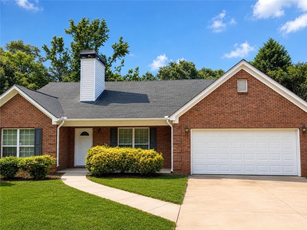 865 McDonough Road Hampton, GA 30228 - Photo 1 of 8 a front view of a house with a yard