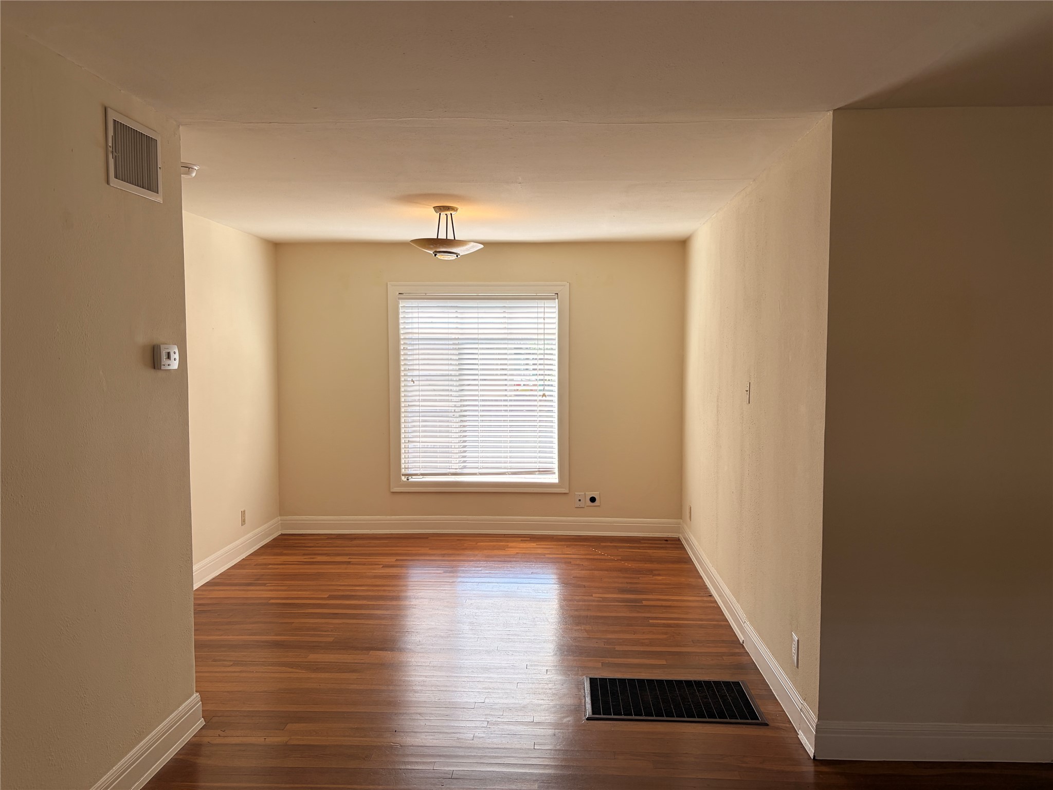 2511 Enfield Road, Unit B Austin, TX 78703 - Photo 2 of 11 Hardwood-finish flooring extending throughout the space