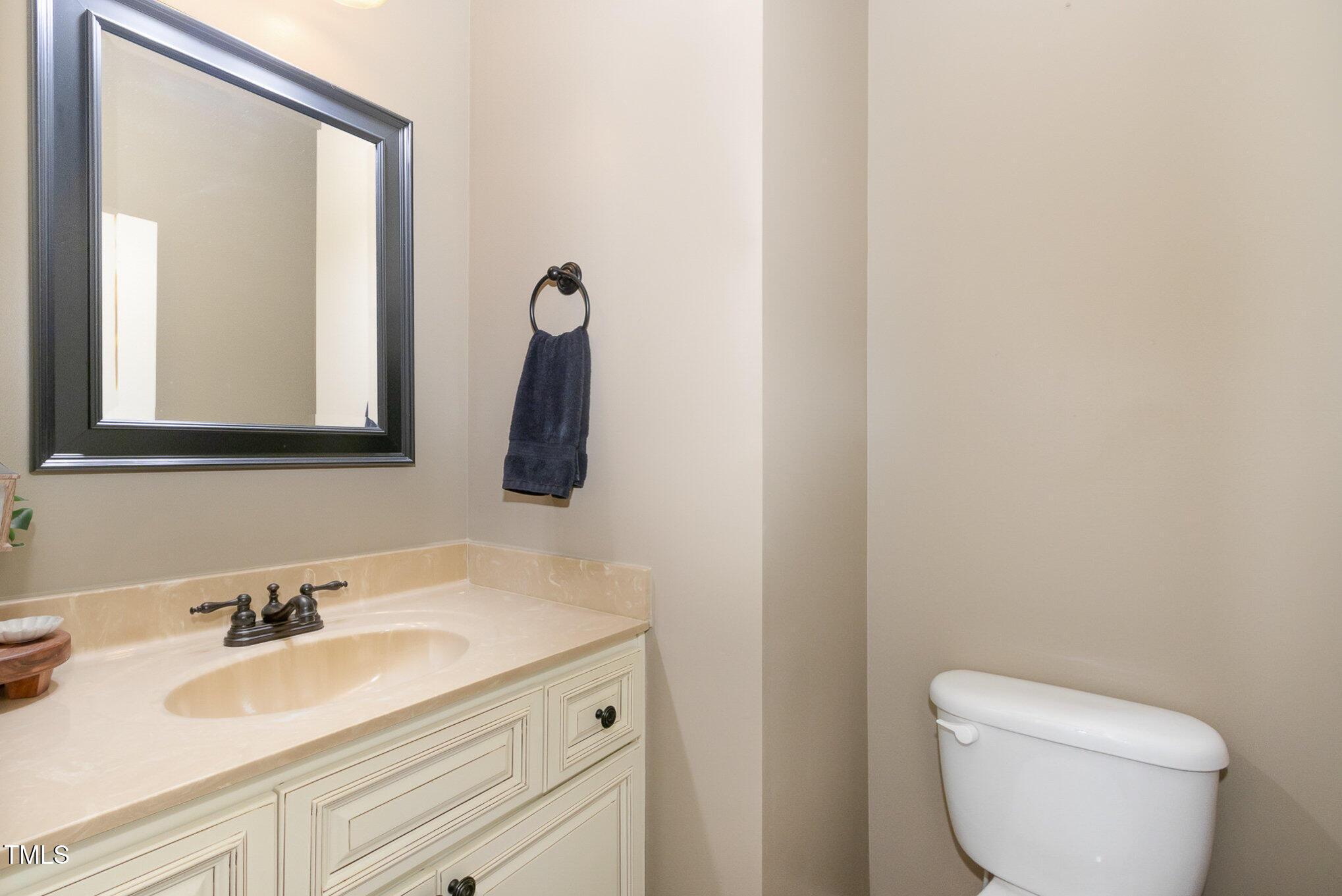 118 Truss Way Durham, NC 27704 - Photo 16 of 27 a bathroom with a toilet sink and mirror