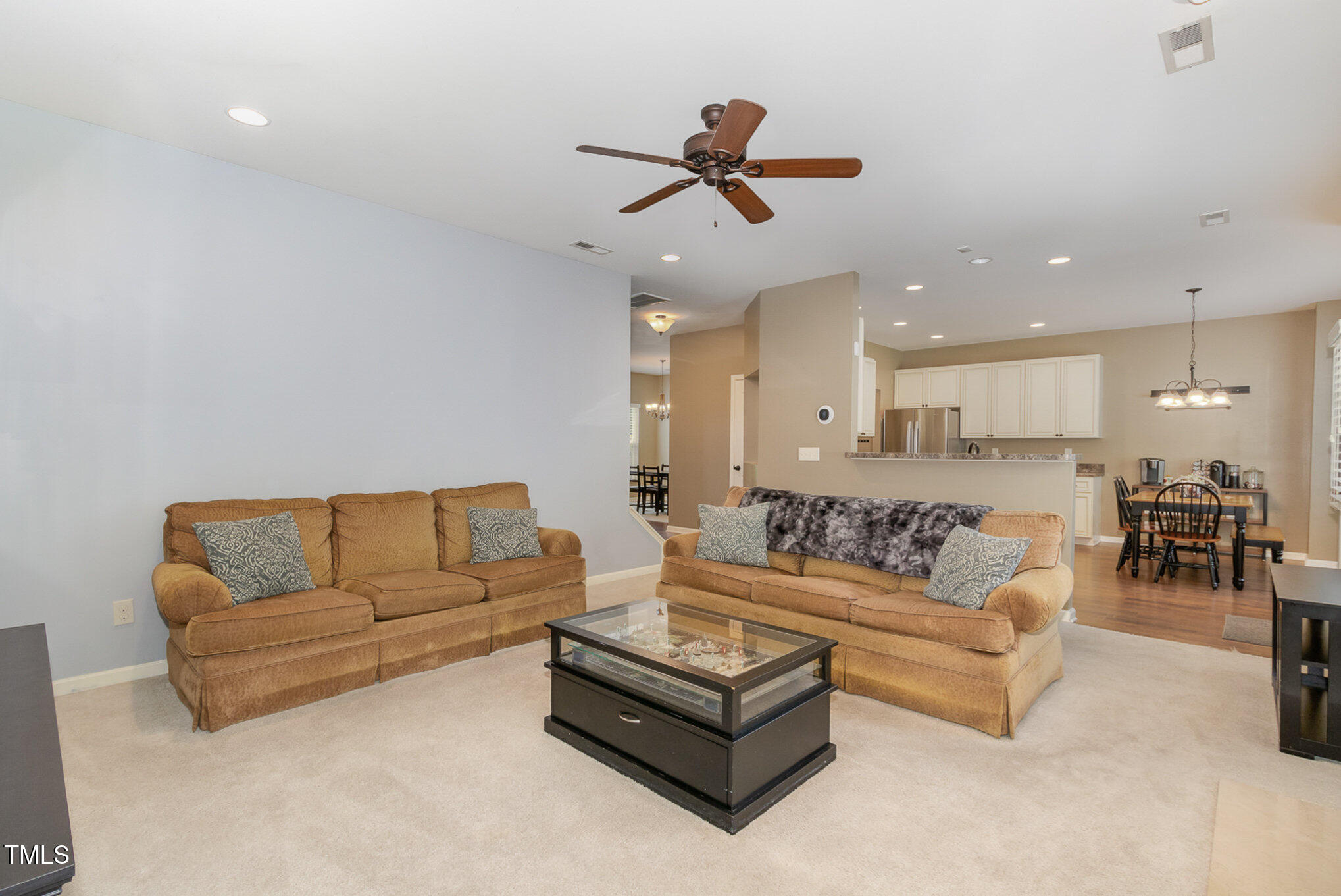 118 Truss Way Durham, NC 27704 - Photo 6 of 27 a living room with furniture and kitchen view