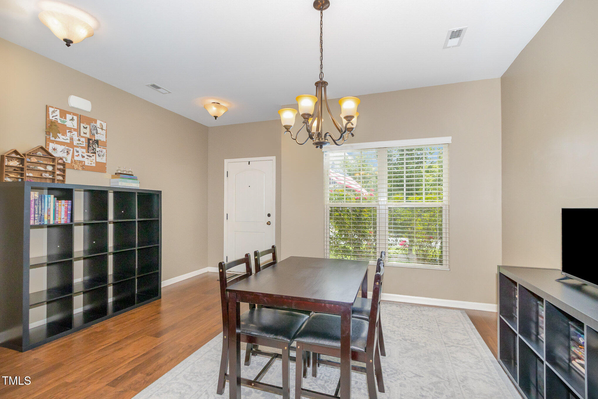 118 Truss Way Durham, NC 27704 - Photo 8 of 27 a view of a dining room with furniture window and wooden floor