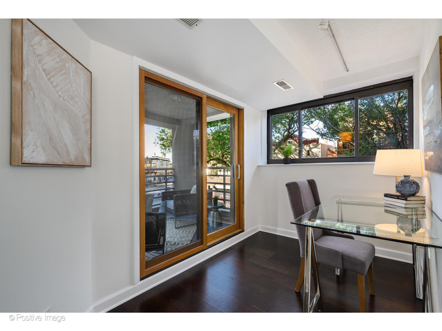 885 West Lill Avenue, Unit 3 Chicago, IL 60614 - Photo 22 of 23 a view of a dining room with furniture large window and wooden floor