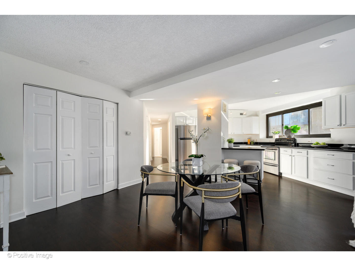 885 West Lill Avenue, Unit 3 Chicago, IL 60614 - Photo 6 of 23 a dining room with furniture and wooden floor