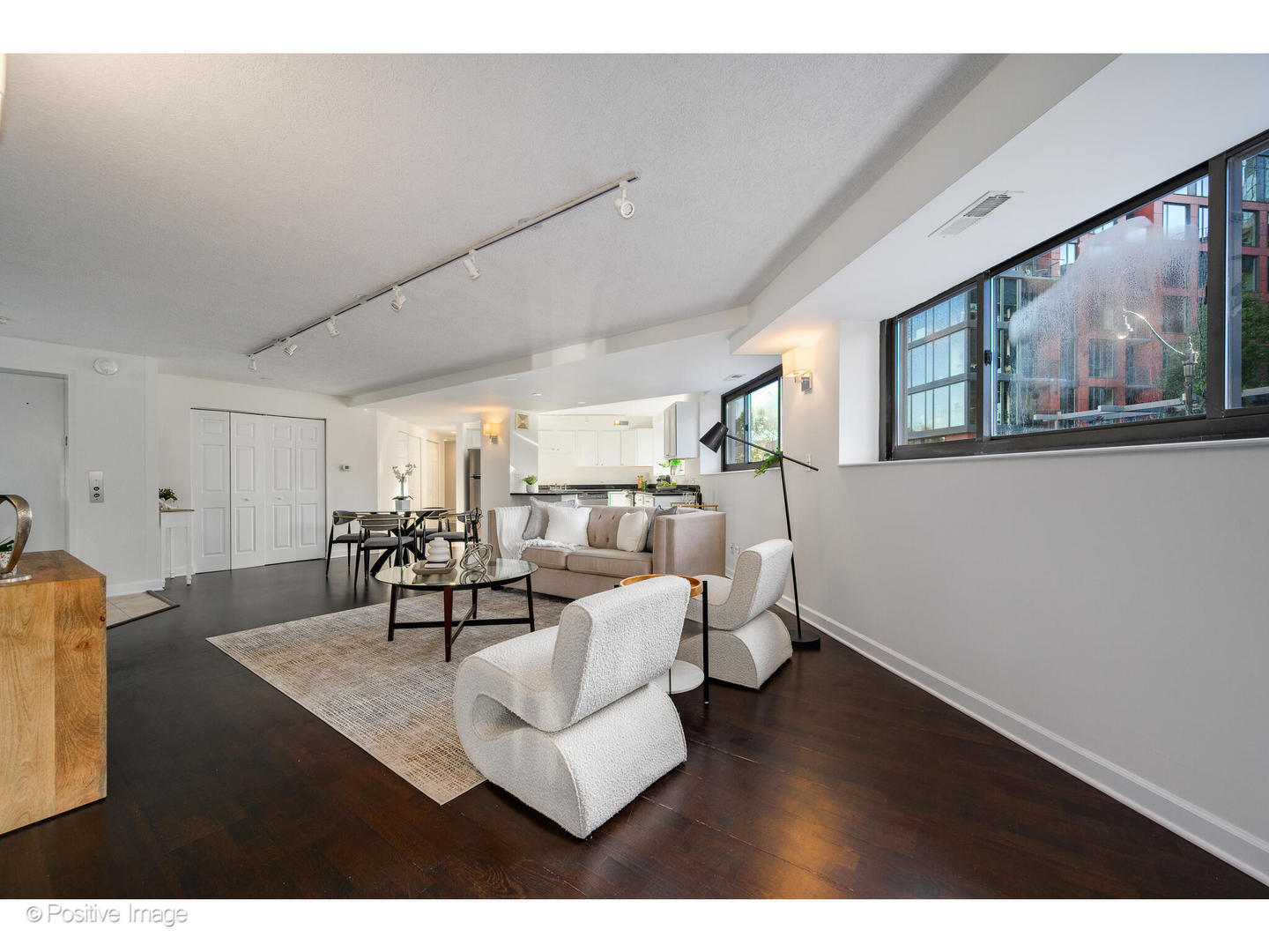 885 West Lill Avenue, Unit 3 Chicago, IL 60614 - Photo 10 of 23 a living room with furniture and wooden floor