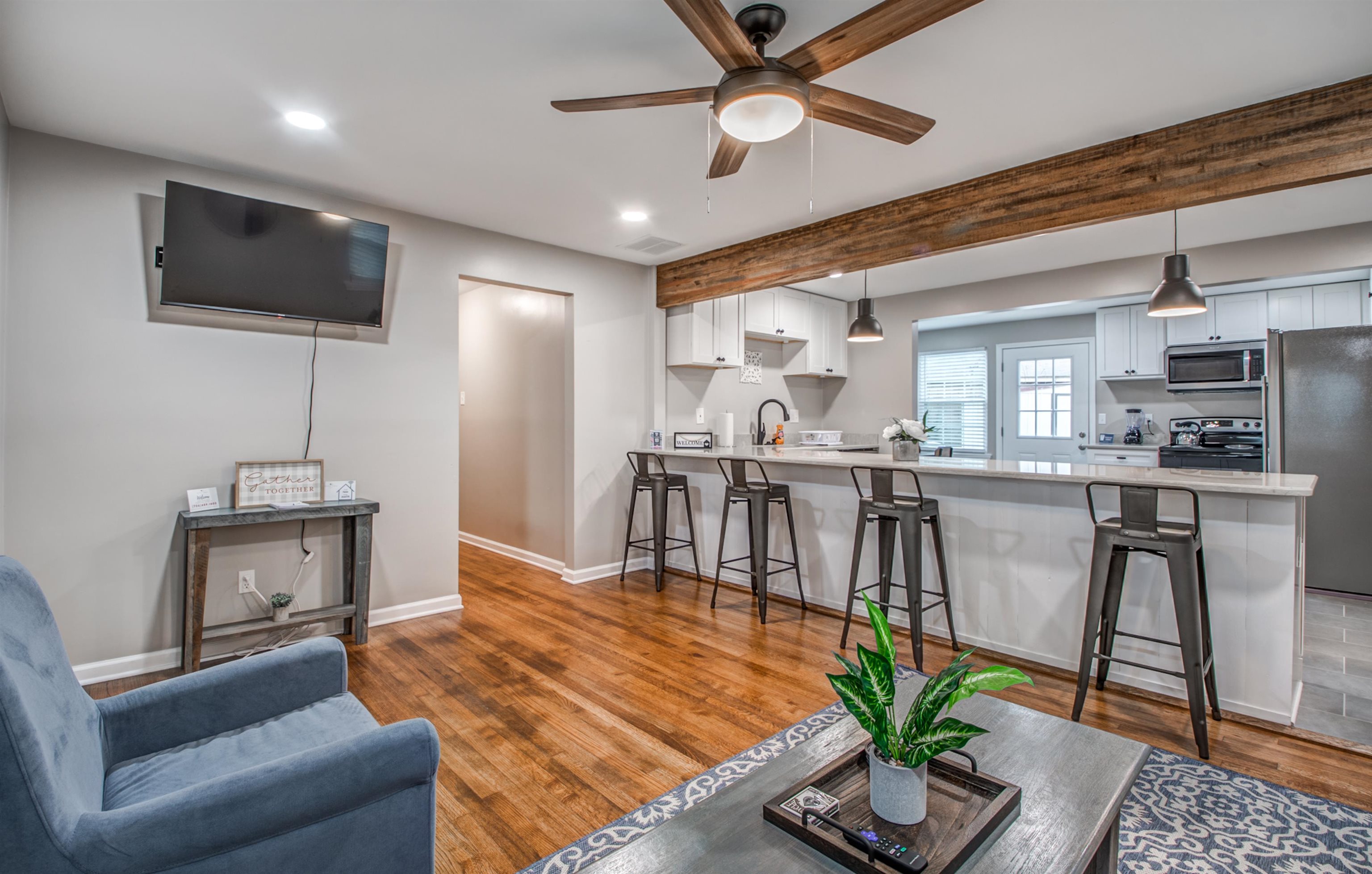 1277 Wellsville Road Memphis, TN 38117 - Photo 13 of 39 a living room with fireplace furniture and a flat screen tv