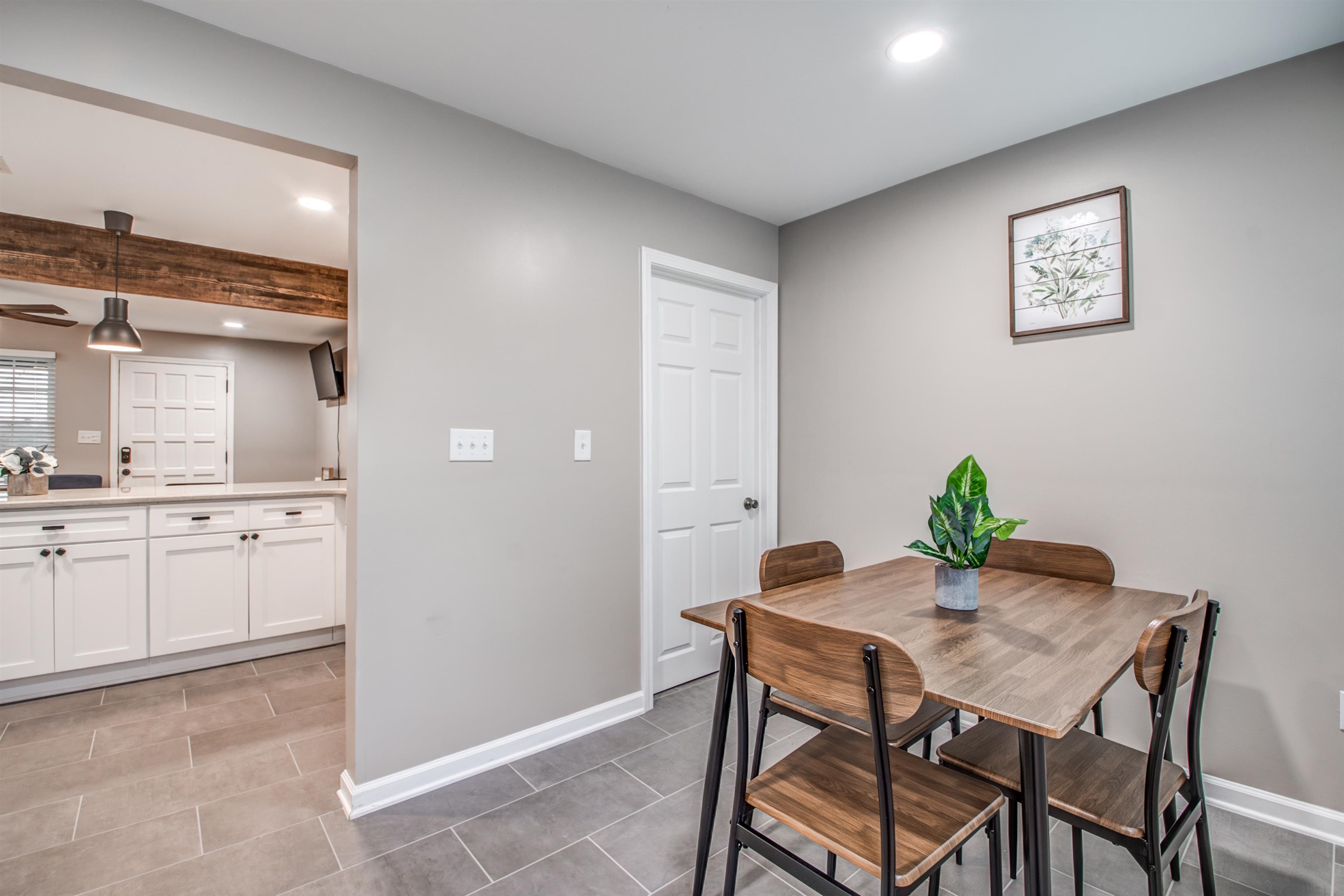 1277 Wellsville Road Memphis, TN 38117 - Photo 24 of 39 a view of a dining room with furniture and wooden floor