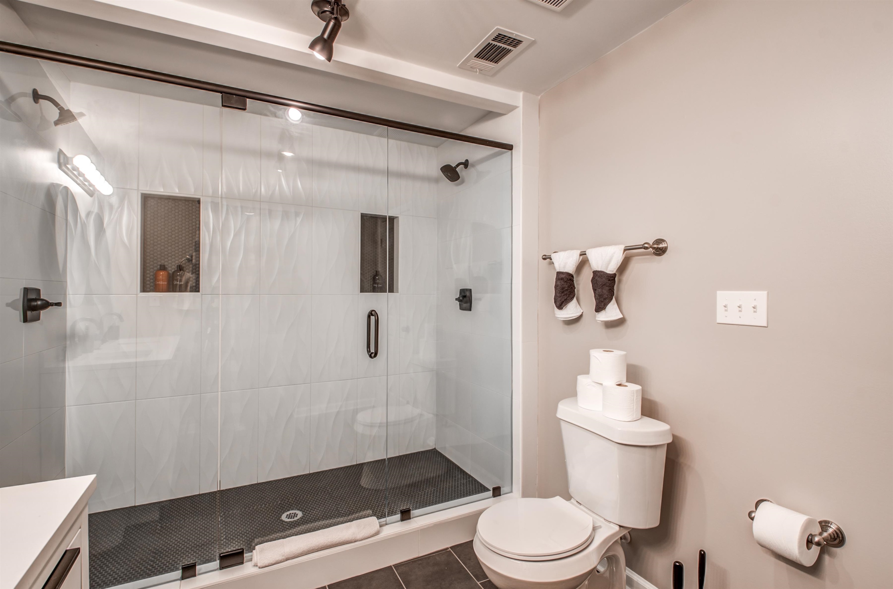 1277 Wellsville Road Memphis, TN 38117 - Photo 32 of 39 a white toilet sitting next to a bathroom sink