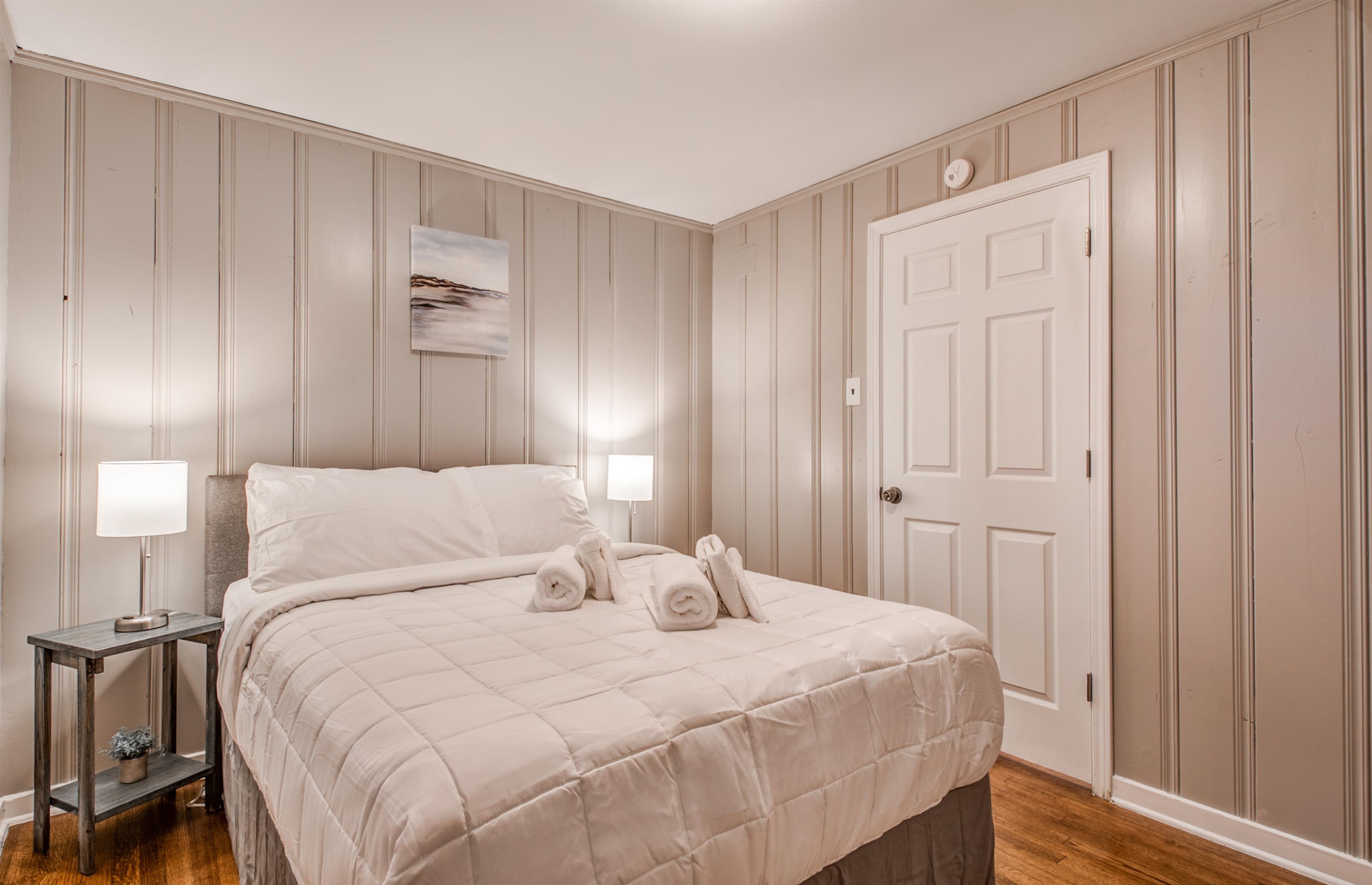 1277 Wellsville Road Memphis, TN 38117 - Photo 35 of 39 Bedroom with wood finished floors and baseboards