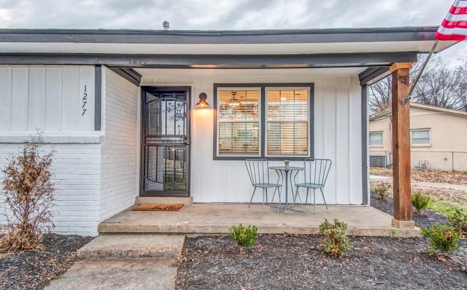 1277 Wellsville Road Memphis, TN 38117 - Photo 3 of 39 Property entrance featuring brick siding and a porch