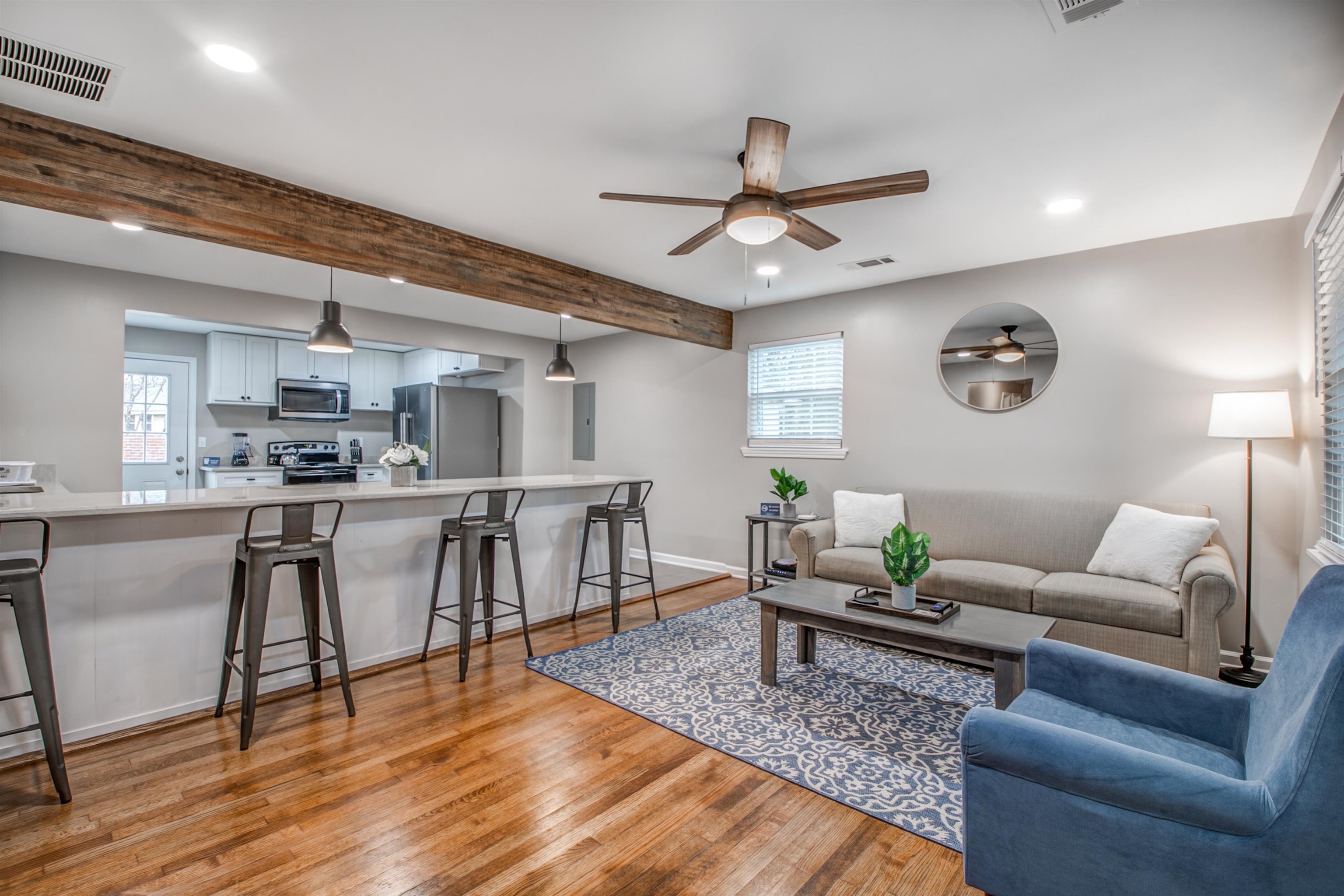 1277 Wellsville Road Memphis, TN 38117 - Photo 5 of 39 a living room with furniture and kitchen view