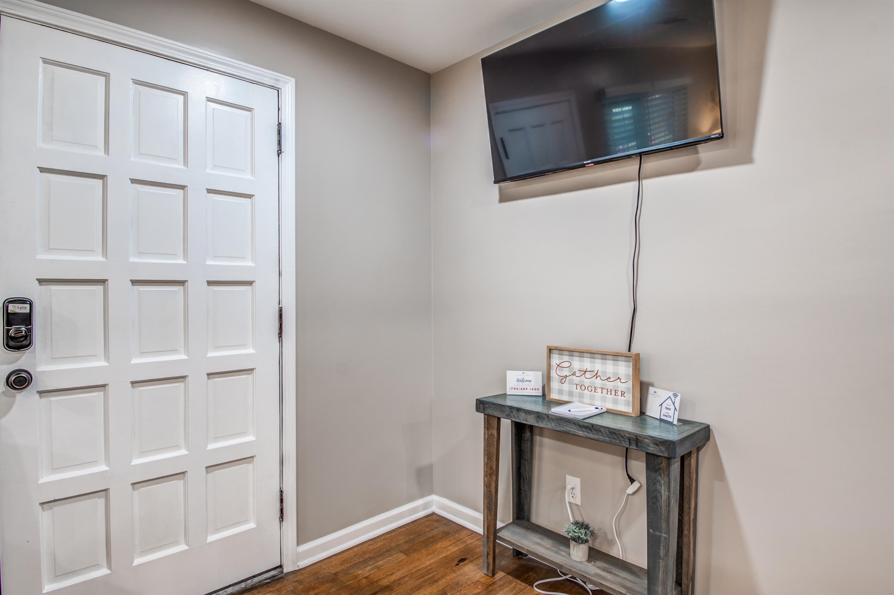 1277 Wellsville Road Memphis, TN 38117 - Photo 9 of 39 a view of a hallway with wooden floor and cabinet