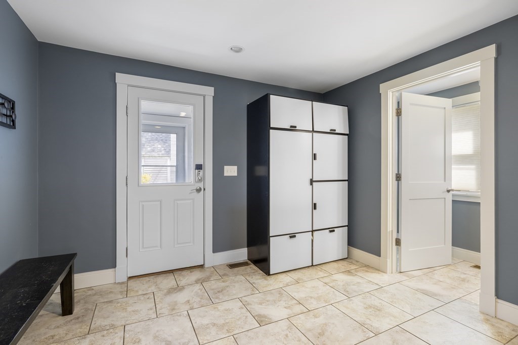 20 Richard Road Lexington, MA 02421 - Photo 11 of 28 an empty room with windows and refrigerator