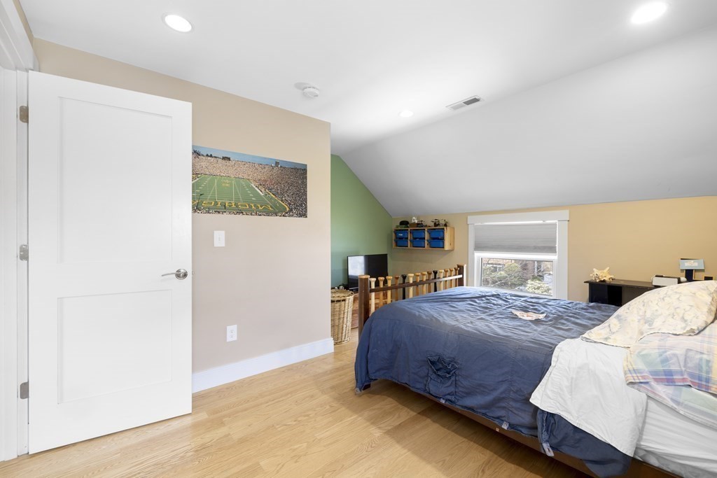 20 Richard Road Lexington, MA 02421 - Photo 19 of 28 a bedroom with a bed and a window