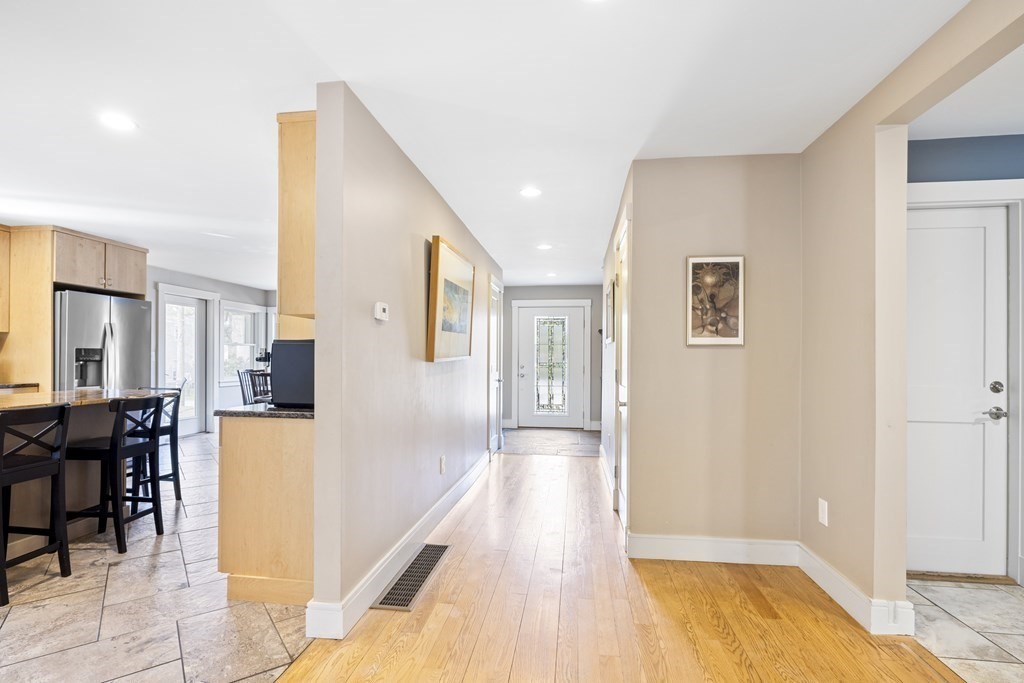 20 Richard Road Lexington, MA 02421 - Photo 10 of 28 a view of a living room with furniture and wooden floor