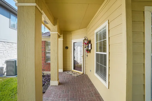 a view of a bathroom with a glass door